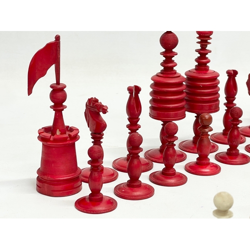 18 - A 19th century carved bone chess set.