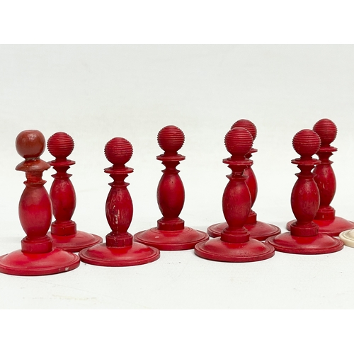 18 - A 19th century carved bone chess set.