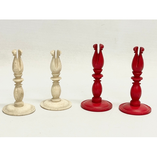 18 - A 19th century carved bone chess set.