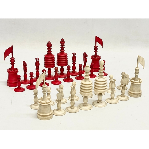 18 - A 19th century carved bone chess set.