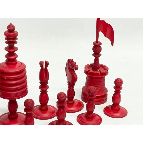 18 - A 19th century carved bone chess set.