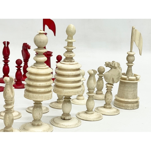 18 - A 19th century carved bone chess set.