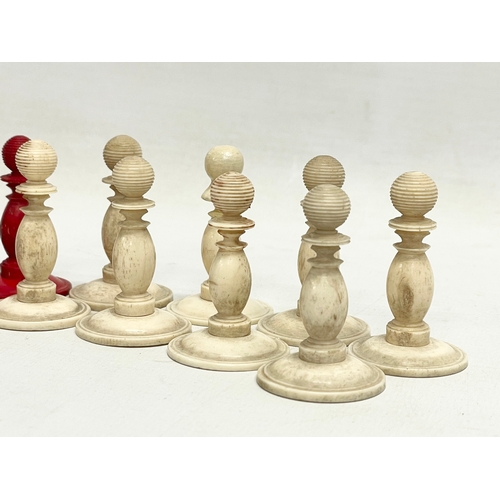 18 - A 19th century carved bone chess set.