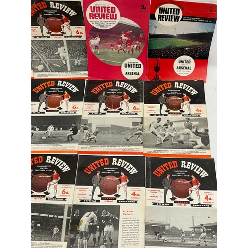 71 - A collection of vintage Manchester United football programmes.