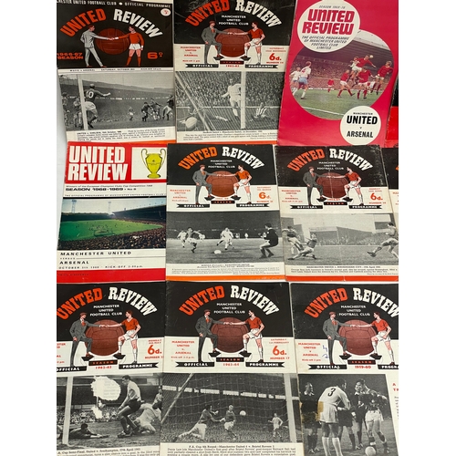 71 - A collection of vintage Manchester United football programmes.