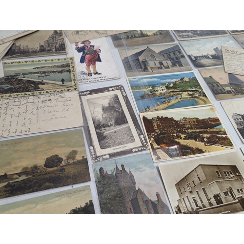 69 - A quantity of early 20th century postcards, including some dating 1959.