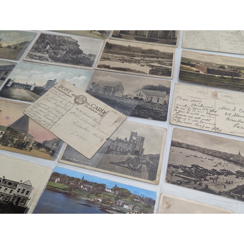 69 - A quantity of early 20th century postcards, including some dating 1959.