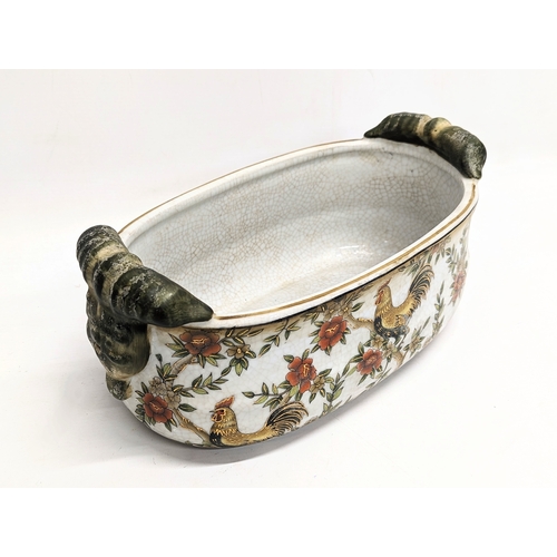 837 - A Chinese pottery jardiniere. 33.5x15cm