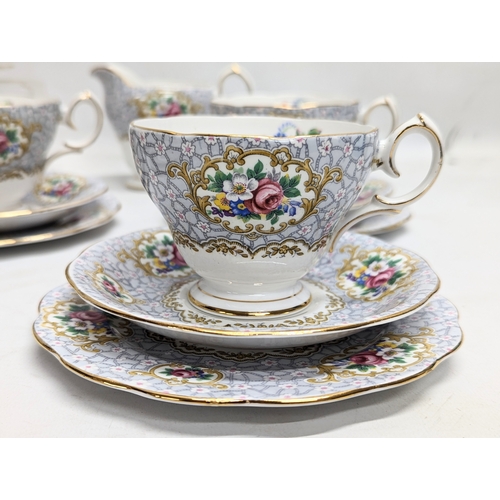 834 - A set of 6 Gainsborough Queen Anne teacups and saucers with a set of 3 Aynsley teacups and saucers.