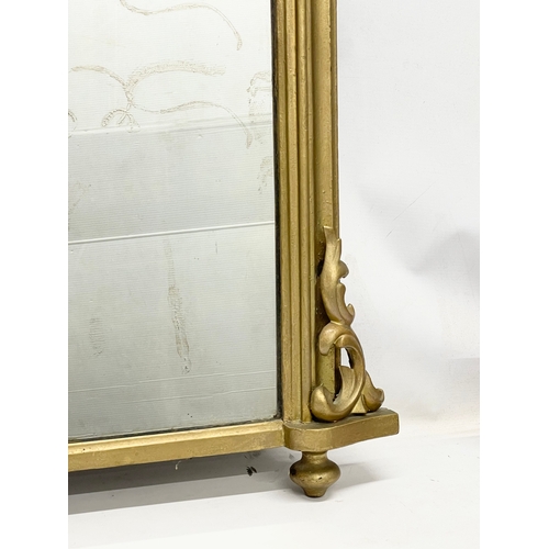 21 - A Victorian gilt framed overmantle mirror. 111x71cm.