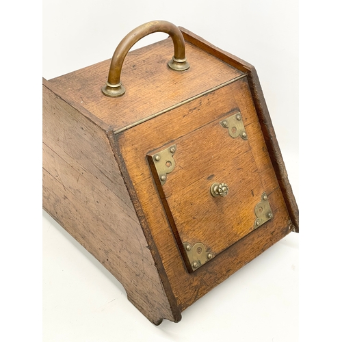 73 - A late Victorian coal scuttle with liner. 34x55x42cm.