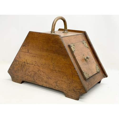 73 - A late Victorian coal scuttle with liner. 34x55x42cm.