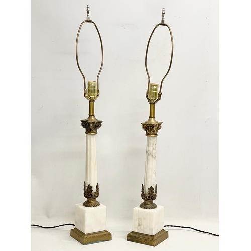 55 - A pair of large onyx and ornate brass lamps with Corinthian style pillars. 83cm