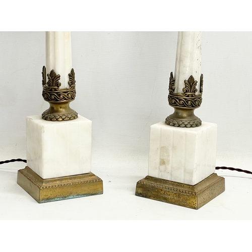 55 - A pair of large onyx and ornate brass lamps with Corinthian style pillars. 83cm