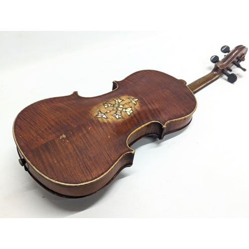 186 - A late 19th century German violin with inlaid Mother of Pearl in case.