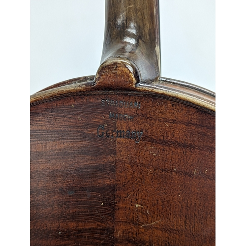 186 - A late 19th century German violin with inlaid Mother of Pearl in case.