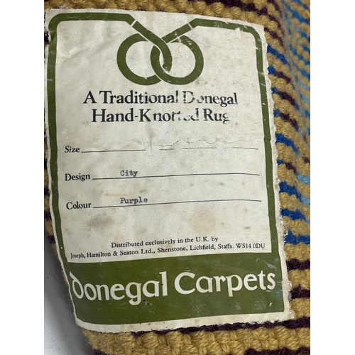 77 - A vintage Traditional Donegal Hand-Knotted Rug. Donegal Carpets. City Design. 87x56cm