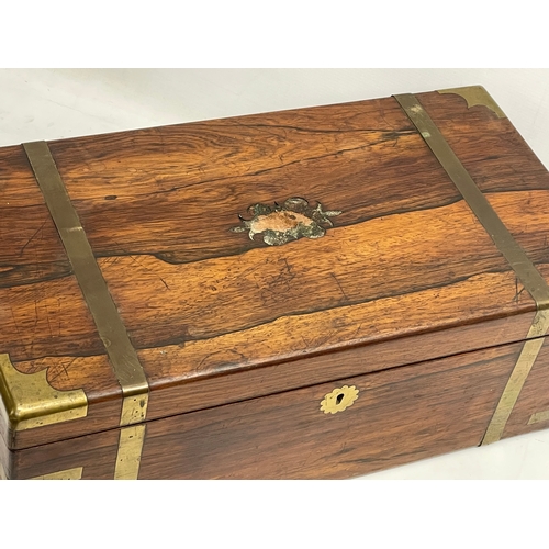 97 - A large Victorian rosewood brass bound writing slope. Closed 51x27x18cm.