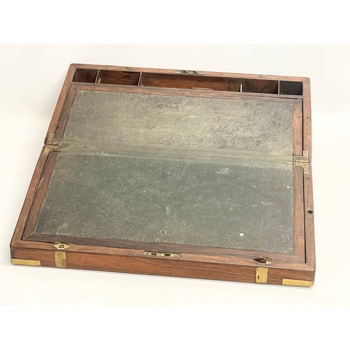 97 - A large Victorian rosewood brass bound writing slope. Closed 51x27x18cm.