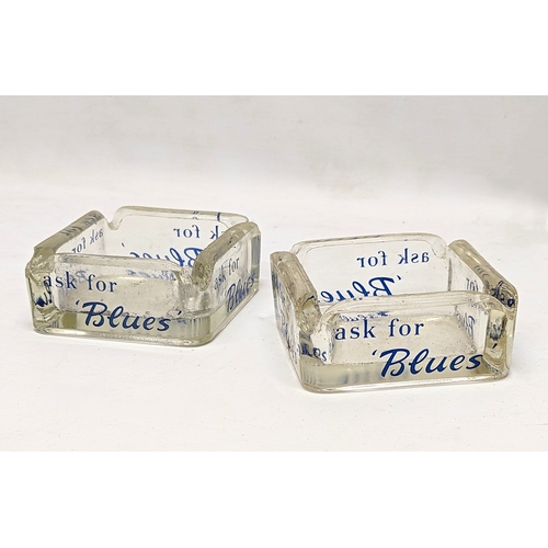 825 - A pair of Blues ashtrays. 10.5x5cm