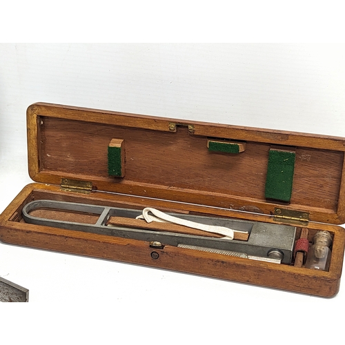 100 - A quantity of vintage precision tools with a vintage Hydrometer.