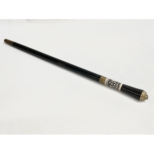 60 - A late 19th/early 20th century Anglo Indian bone and ebony sword stick.