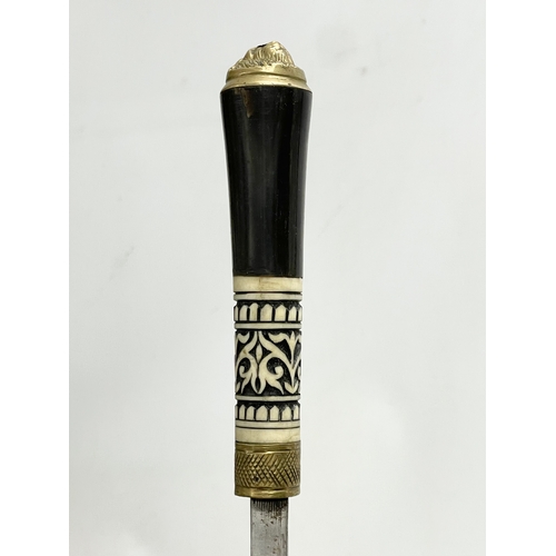 60 - A late 19th/early 20th century Anglo Indian bone and ebony sword stick.