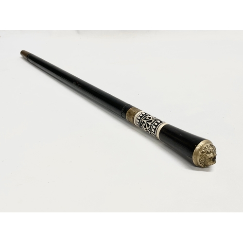 60 - A late 19th/early 20th century Anglo Indian bone and ebony sword stick.