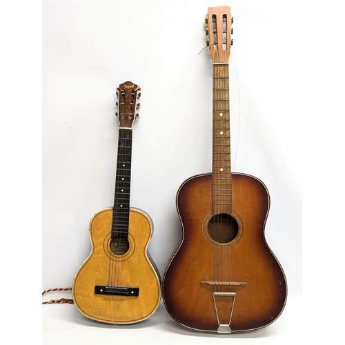 318 - 2 accoustic guitars. Largest guitar with case.