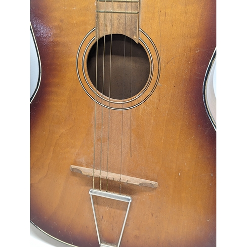 318 - 2 accoustic guitars. Largest guitar with case.