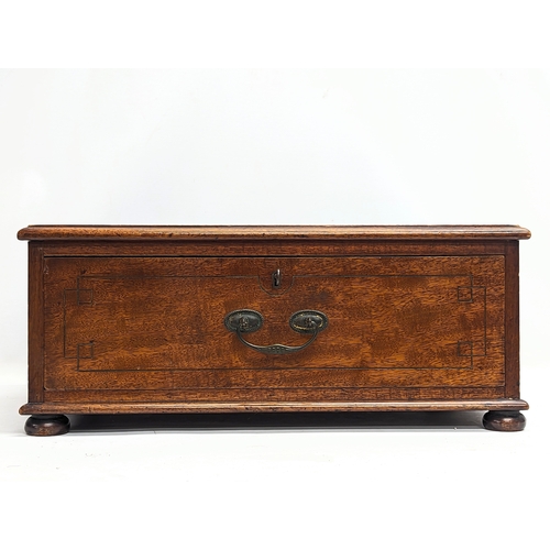 108 - A late Victorian mahogany table top chest, with key. 49.5x33x20.5cm