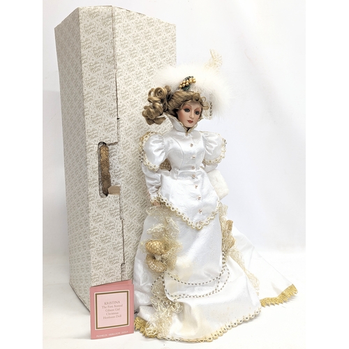 319 - A large doll by Franklin Heirloom Dolls, 