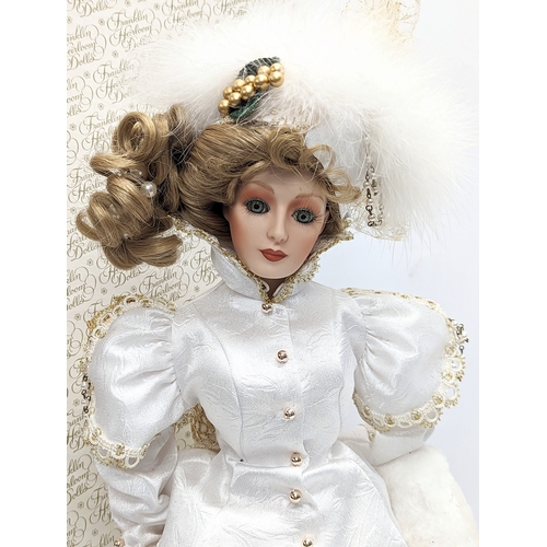 319 - A large doll by Franklin Heirloom Dolls, 