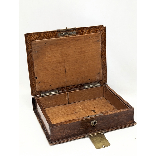 110 - A late Victorian oak brass bound Bible box. 29.5x22x7.5cm