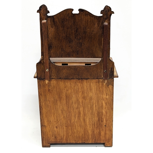 113 - An early 20th century apprentice dressing chest. 19.5x10.5x34cm