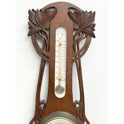 130 - A late Victorian barometer. 58cm