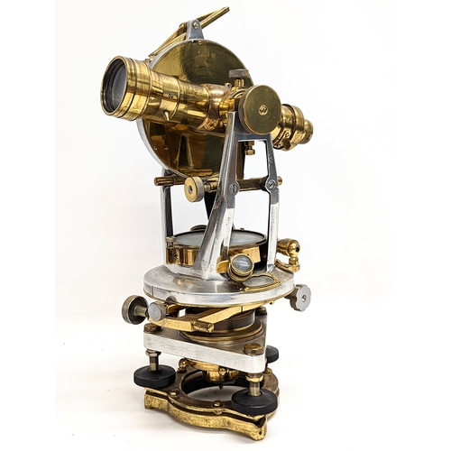 27 - An early 20th century brass Theodolite with compass and spirit levels. 22x36.5cm