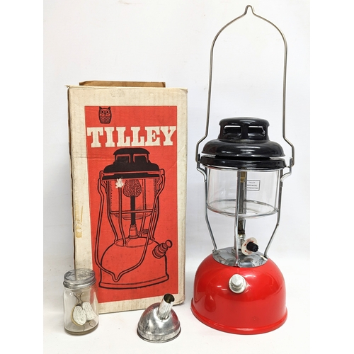 486 - A vintage Tilly oil lamp, in original box. 52.5cm