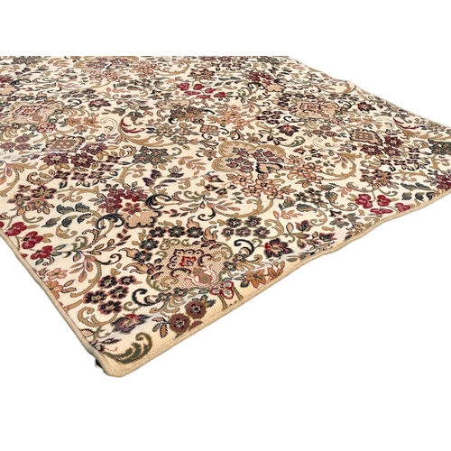 A large wool rug. 170x285cm