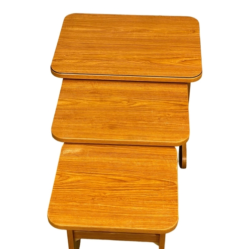 1612 - A Mid Century nest of tables.