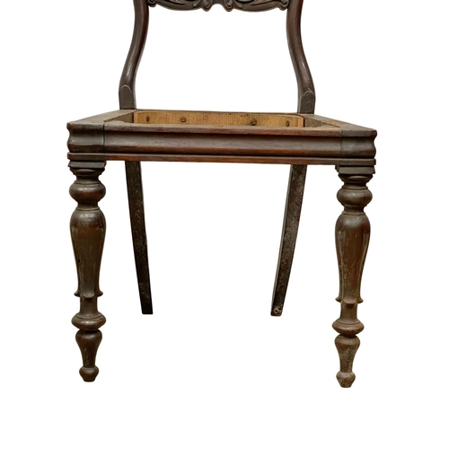 1616 - A set of 4 Victorian rosewood balloon back chairs.