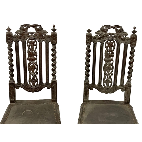 1618 - A pair of late 19th century Jacobean style carved oak side chairs. Circa 1880-1900.