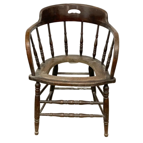 1620 - An Edwardian oak desk chair.