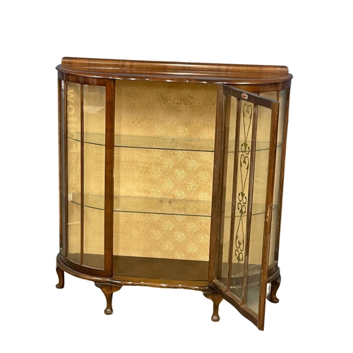 246 - A vintage china cabinet. 107x31x113cm