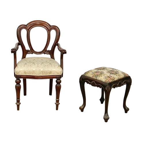 248 - An Irish Chippendale style footstool and a Victorian style mahogany balloon back chair.