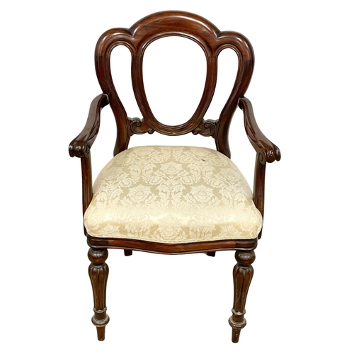 248 - An Irish Chippendale style footstool and a Victorian style mahogany balloon back chair.