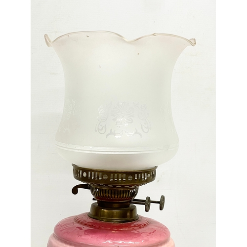 1 - A tall Victorian double burner oil lamp. 61.5cm