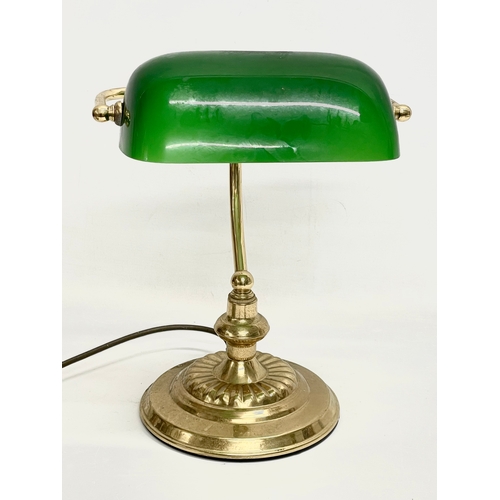 8 - A brass desk lamp with glass shade. 28x35cm.