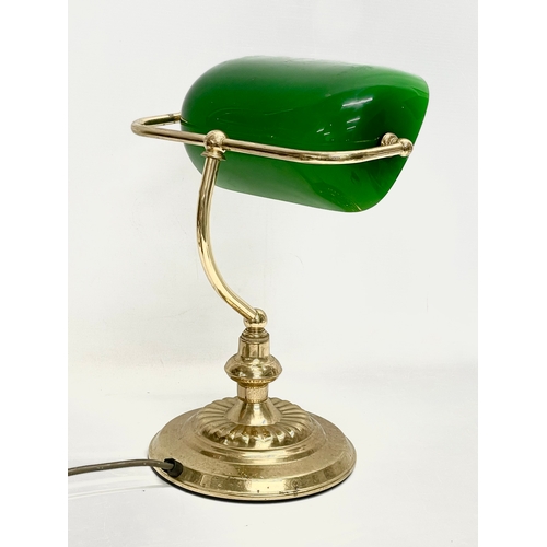 8 - A brass desk lamp with glass shade. 28x35cm.