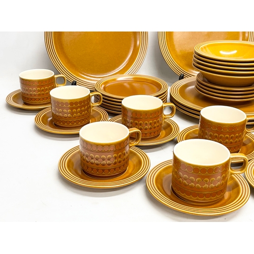 14 - A 53 piece vintage Hornsea ‘Saffron’ tea and dinner set. 6 dinner plates. 12 sandwich plates. 5 bowl... 